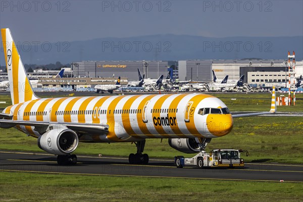 A Condor aircraft being towed