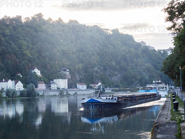 Cargo ship on the Danube in the morning light