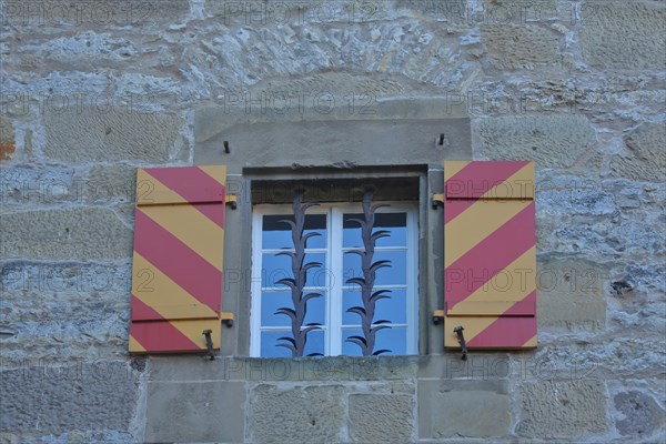 Window with lattice on historic new building