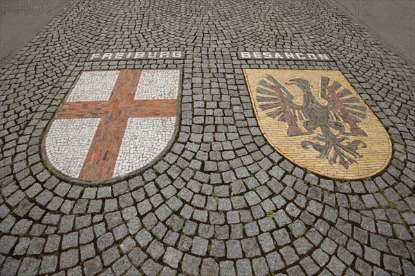City coat of arms with floor mosaic from the twin city of Freiburg im Breisgau