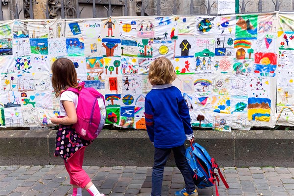 Children ask about life and future prospects on banners