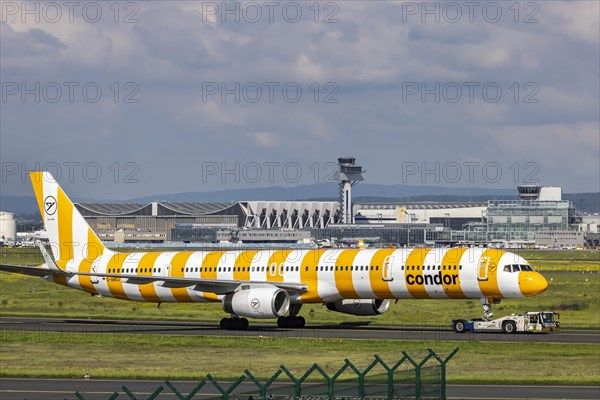 A Condor aircraft being towed