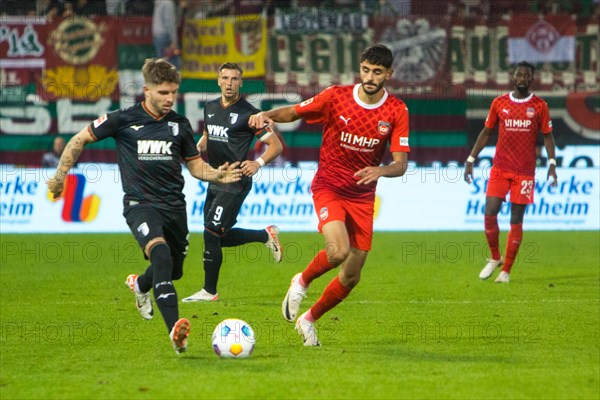 Mads G. V. PEDERSEN FC Augsburg left in duel with Eren DINKCI 1.FC Heidenheim