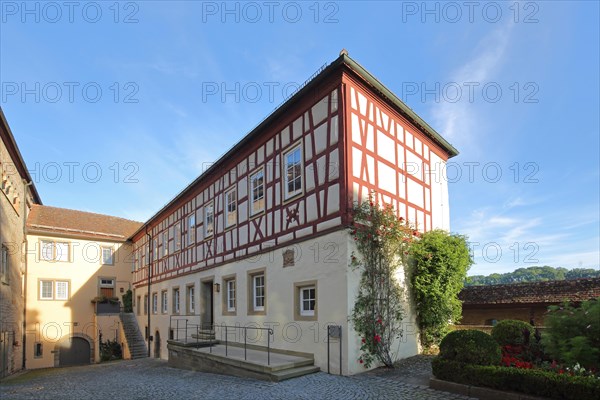 Half-timbered house in the courtyard of the Romanesque Comburg Monastery