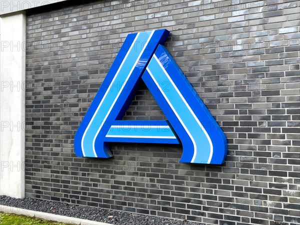 Perspective photo of logo A in blue without lettering on wall of supermarket of retail chain supermarket Aldi Nord