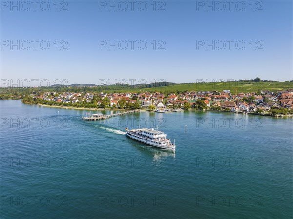 Aerial view of the Lake Constance municipality of Hagnau with the landing stage and the departing scheduled ship MS Swabia of the Lake Constance-Schiffsbetriebe