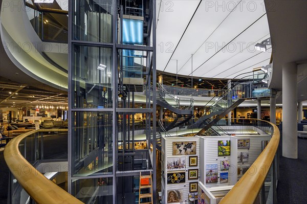 Lift and stairs in a modern furniture store