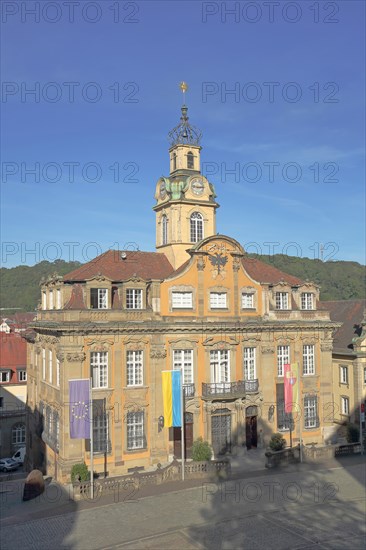 Baroque town hall with tower built 1735 with Ukrainian national flag