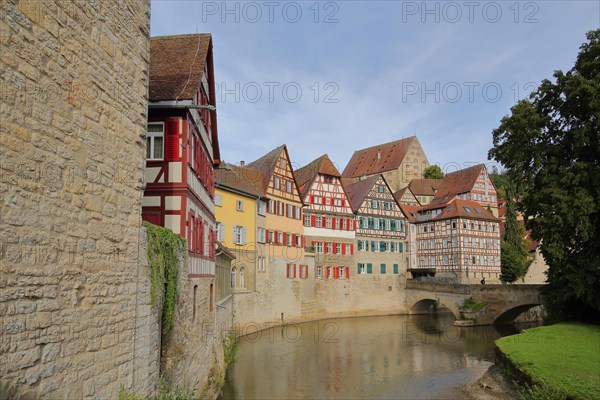 Stone wall from Sulfer tower and view from Sulfer bridge onto Kocher with red former Haalamt