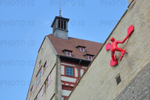 Sculpture Fin Man by Rosalie 2008 at the historic town wall and town hall animal figure