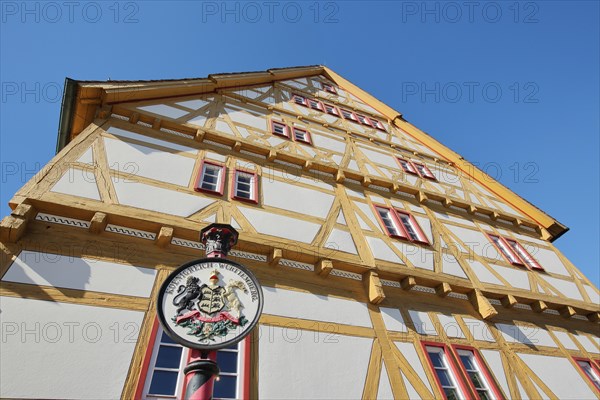 Historical house of the town history with coat of arms