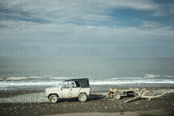 Jeep with trailer on Black Sea beach