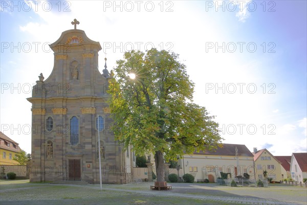 Parish church Kreuzauffindung in the backlight