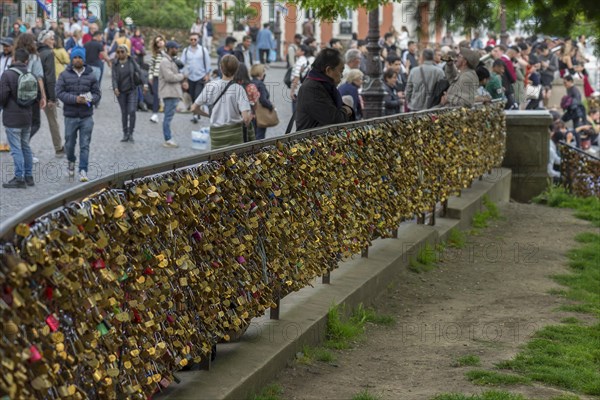 Love locks on the railing in the square in front of the Sacre Coeur Monmartre