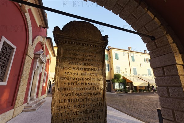 Memorial stone to the translator Domizio Calderini