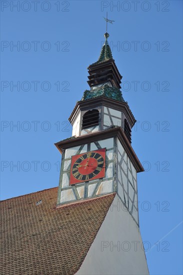 Church tower with clock of the Gothic Church of St. Nicholas