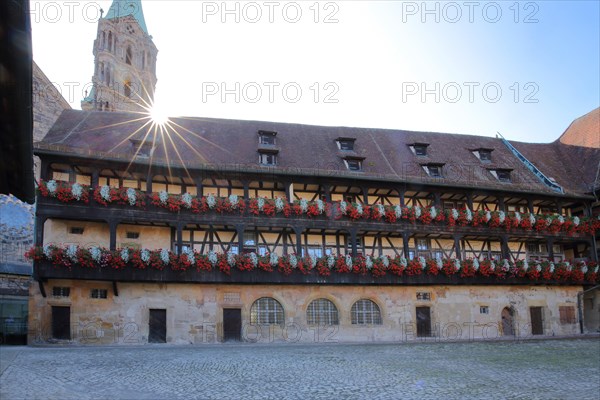 Inner courtyard of the Alte Hofhaltung built 15th century with floral decoration in the backlight