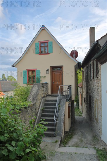 Narrow half-timbered house on the historic town wall