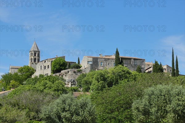 View of mountain village La Garde-Adhemar with St-Michel church