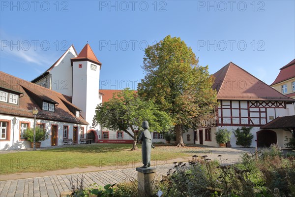 Inner courtyard with museum and sculpture