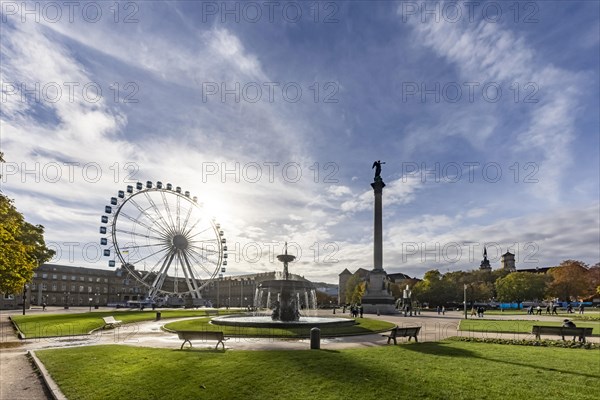 Ferris wheel in the courtyard of the Neues Schloss. Schlossplatz