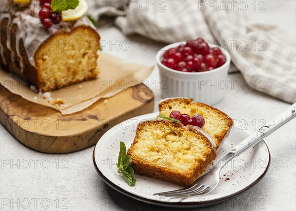 High angle cake slices plate with berries