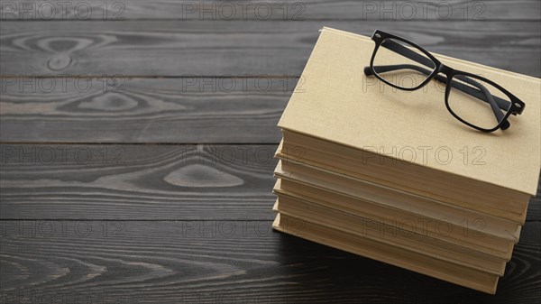 High angle glasses books stack