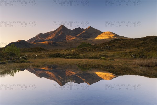 Cuillin Mountains reflected in loch