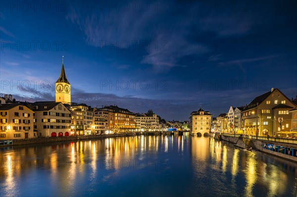 Old Town of Zurich with St. Peter's Church and Town Hall on the Limmat