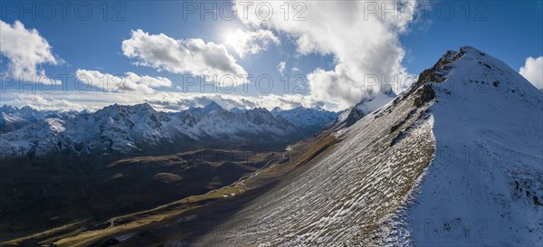 Autumn landscape with snow-covered mountains on the Albula Pass