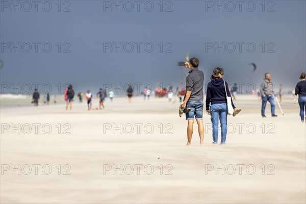 Sand kicked up during storm on the North Sea coast in De Panne