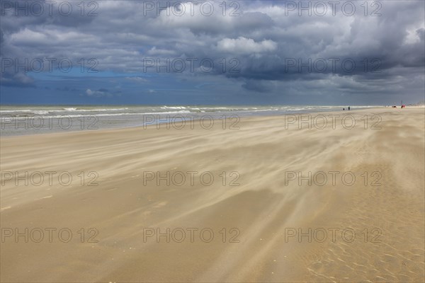 Sand kicked up during storm on the North Sea coast in De Panne