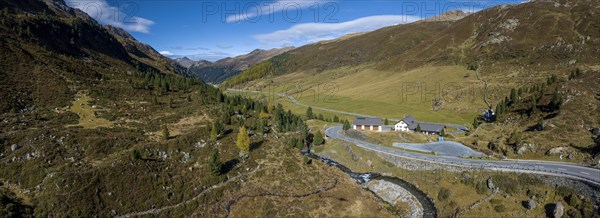 Colourful larches and mountain panorama