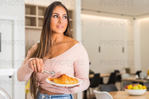 Beauty woman having breakfast in an all-you-can-eat buffet in a hotel