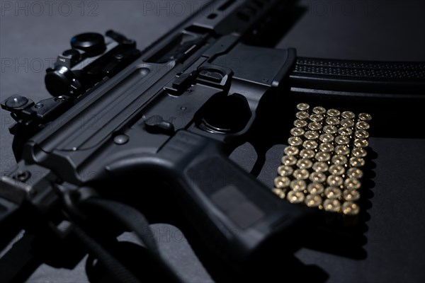 Modern Elegant Assault Rifle and Bullet on Grey Background in Switzerland