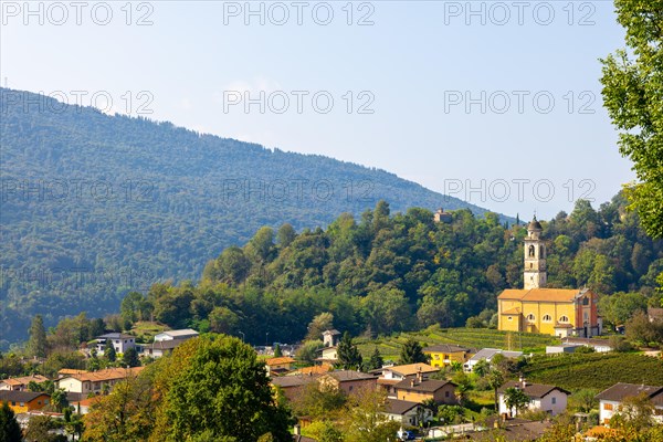 San Martino Provost Church on Mountain Range and Valley with Sky in a Sunny Summer Day in Malcantone