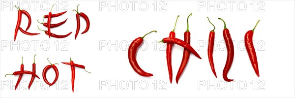 Red chilli peppers arranged to spell out RED HOT CHILI . The chillies are against a white background