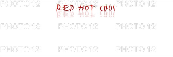 Red chilli peppers arranged to spell out RED HOT CHILI . The chillies are against a white background