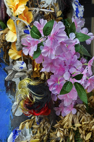 Flower arrangement with artificial Japanese camellia