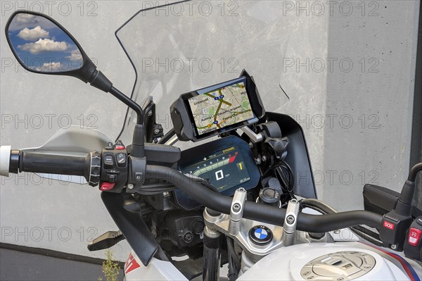 Modern cockpit of a BMW motorbike with screen and navigation system