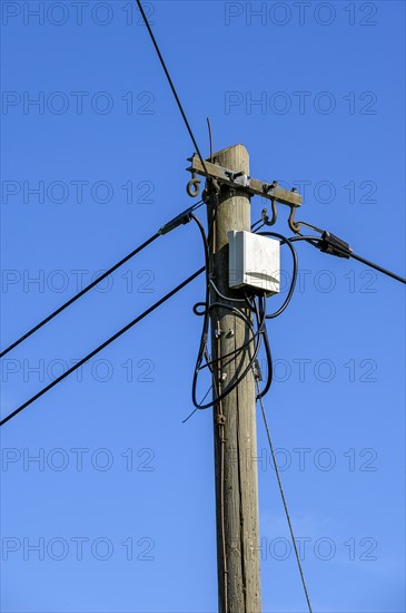 Old wooden electricity pylon