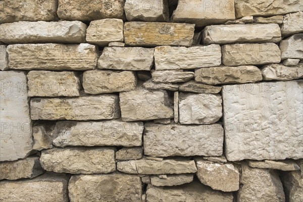 Old sandstone wall as background and texture