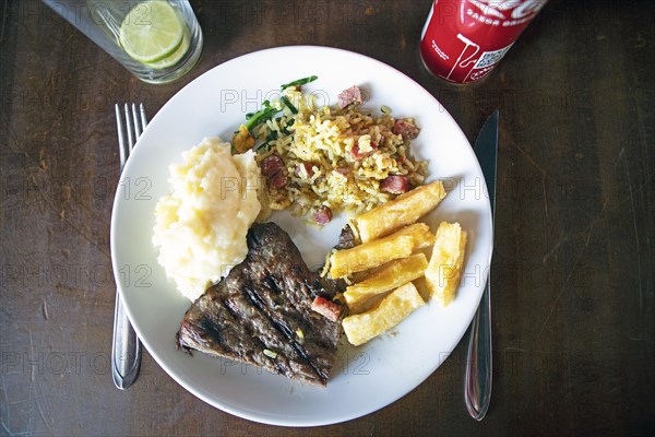 Grilled alcatra or rump steak with sweet potatoes