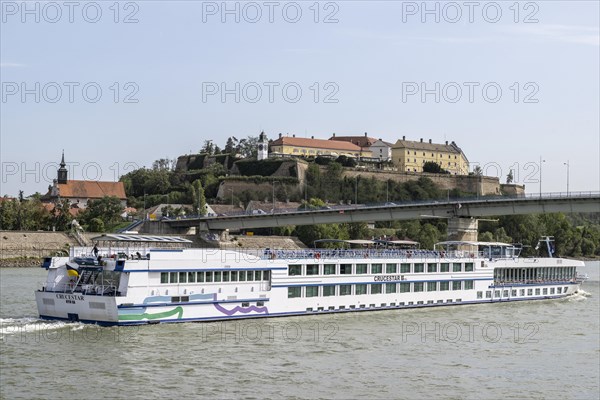 River cruise ship in front of Petrovaradin Fortress