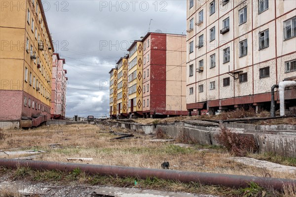 Damage caused by thawing permafrost in a housing estate