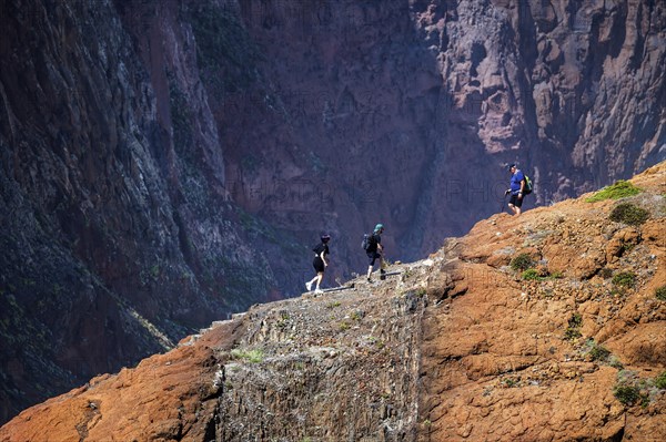 Hikers on trail on Ponta de São Lourenço peninsula