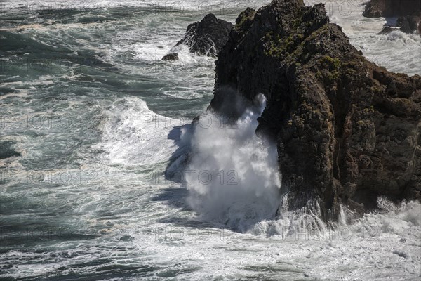 Sea surf on lava rocks