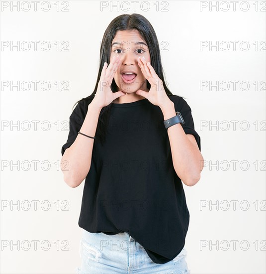 Young woman screaming and announcing at the camera. Young girl announcing something to the camera