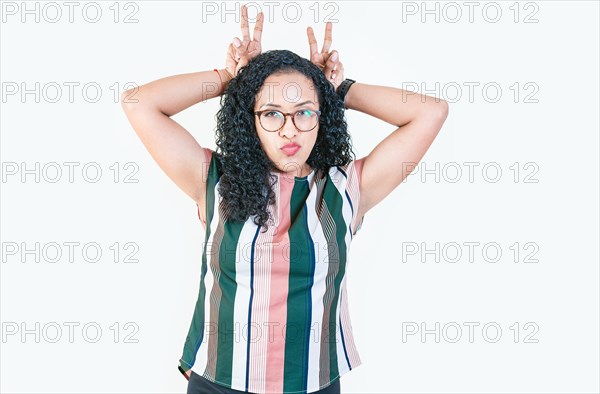 Afro girl making horns gesture with their fingers