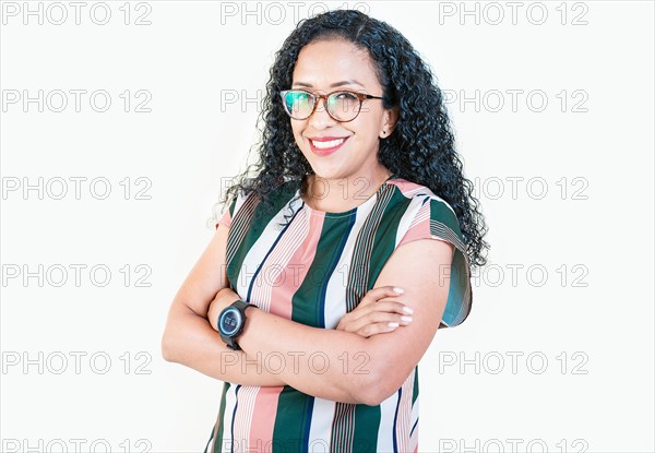 Portrait of attractive afro girl with arms crossed isolated. Smiling afro girl with arms crossed looking at camera. Nicaraguan woman on isolated background